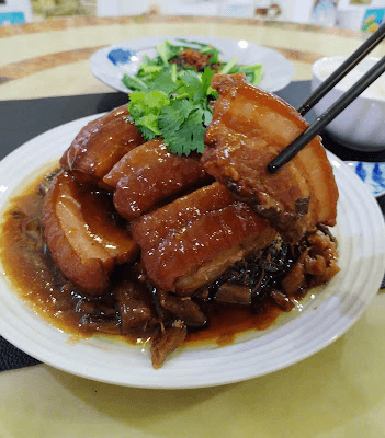 Step 3.1: Cover the bowl of pork with your serving plate and flip it over onto the plate