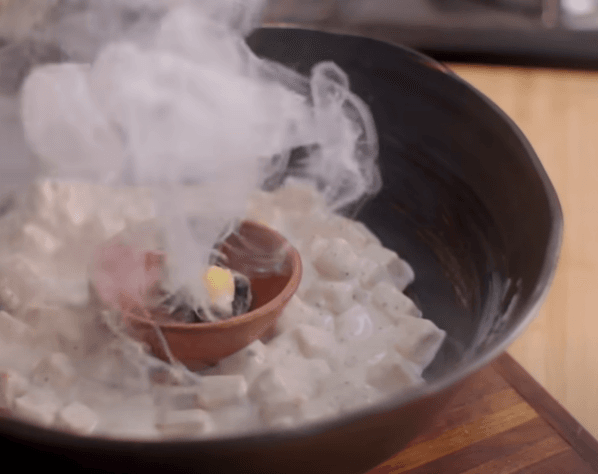 Step 1.1: Place a small bowl on the filling and place a piece of live charcoal in it
