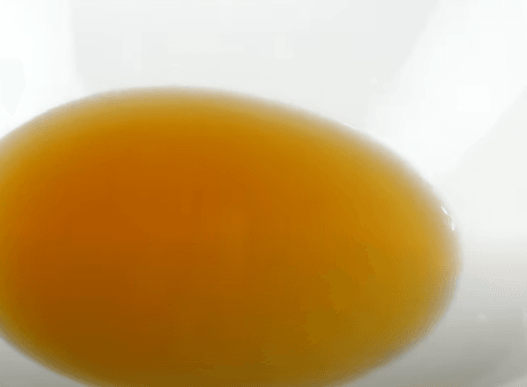 Step 1.1: In a bowl, add water and honey
