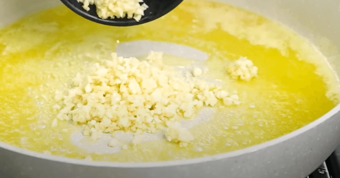Step 2.1: Add garlic and sauté for a minute