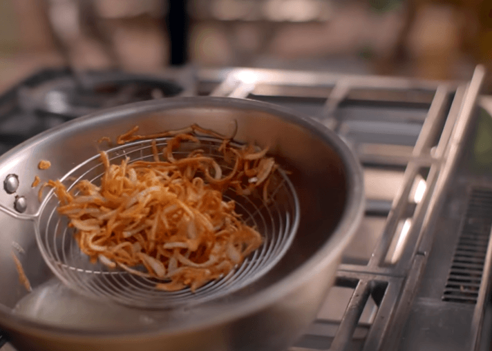 Step 1.1: Add the sliced onions into the oil and stir well