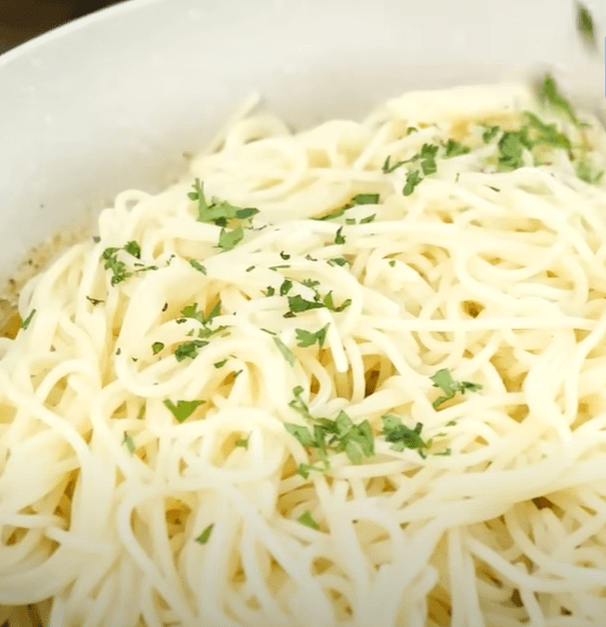 Step 2.1: Add boiled spaghetti, fresh coriander, and toss well