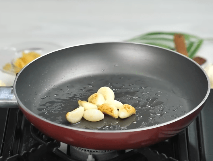 Step 1.1: In a frying pan, add cooking oil and garlic