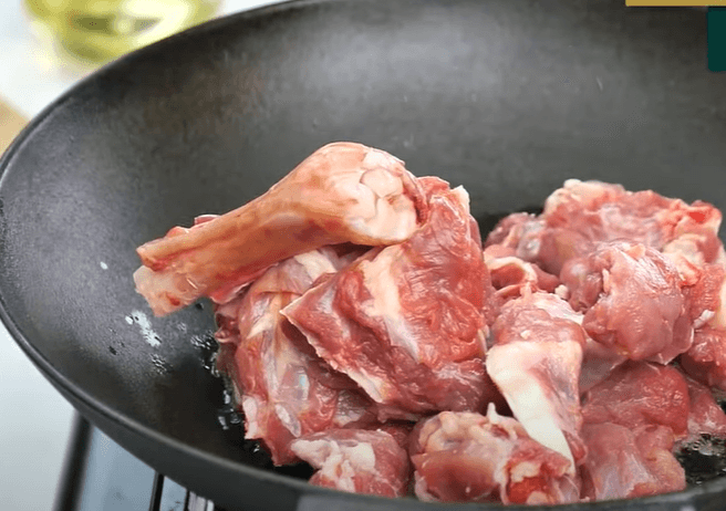 Step 1.1: Add mutton, mix well, and cook on high flame for 4-5 minutes