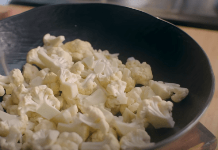 Step 1.1: Cut the cauliflower into bite-sized florets