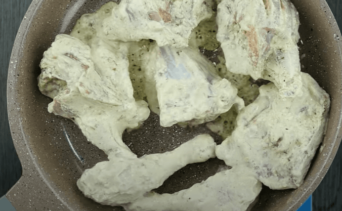 Step 1.1: In a frying pan, add oil and marinated chicken pieces