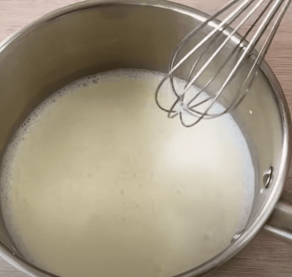 Step 1.1: In a saucepan, mix the cornstarch with a little bit of milk to make a smooth paste