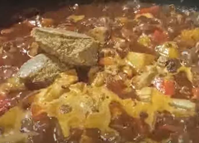 Step 1.1: Once boiling, add the liver spread, laurel leaves, and raisins