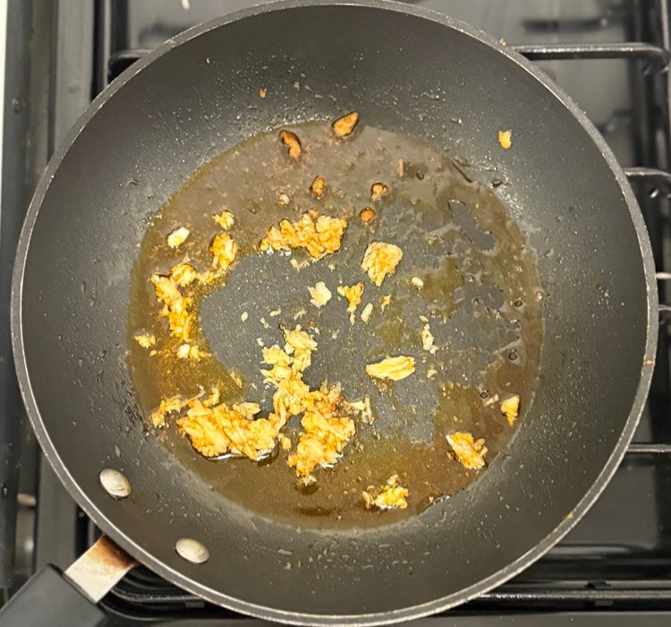 Step 2.1: Using the same pan, add crushed garlic and cook on medium heat until fragrant