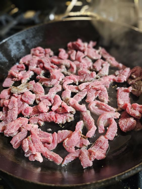 Step 1.1: Add the beef in small batches, making sure to not overcrowd the pan
