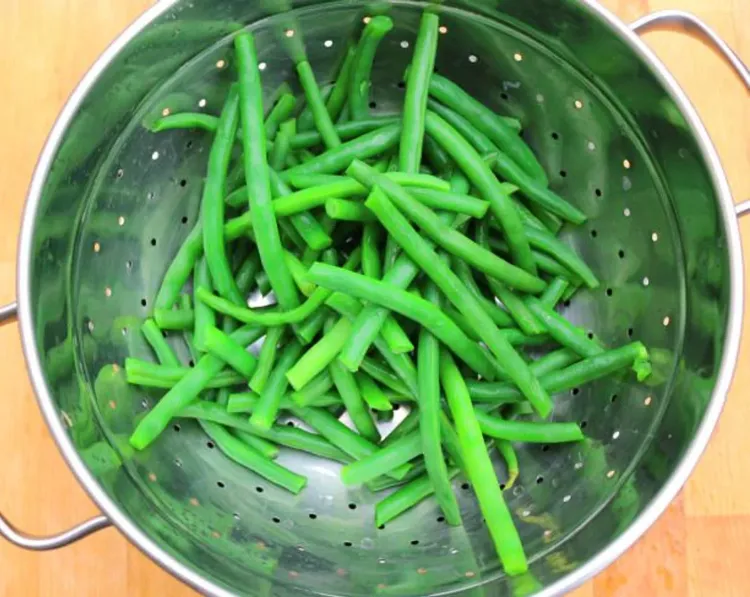 Step 1.1: Blanch the Green Beans by dropping them in boiling water for 60 seconds, then transfer them to a bowl of ice water to stop the cooking