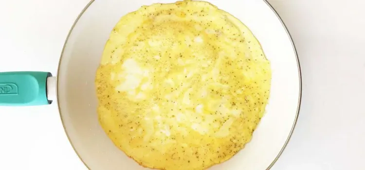 Step 1.1: Allow the egg to cook for 2-3 minutes or until cooked through and set