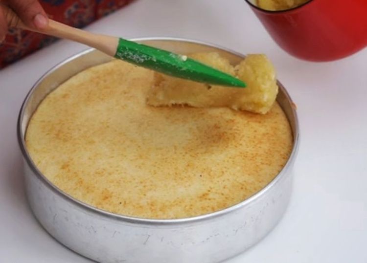Step 2.1: Pour the coconut mixture over the cake and spread evenly