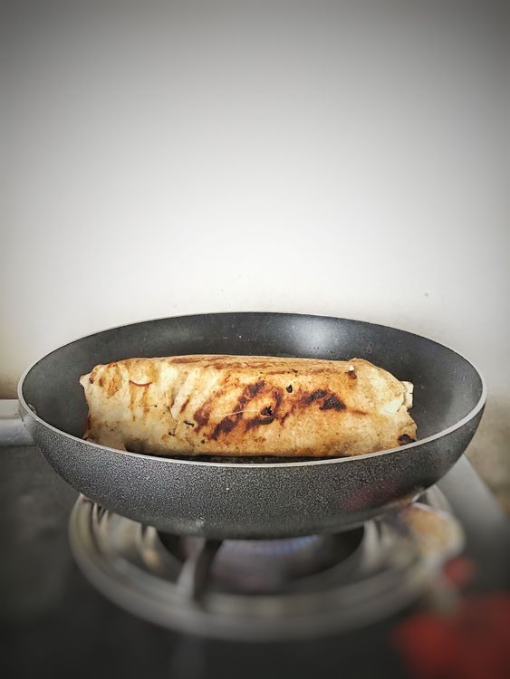 Step 5.1: Put a pan on low heat and carefully go in with the wrap