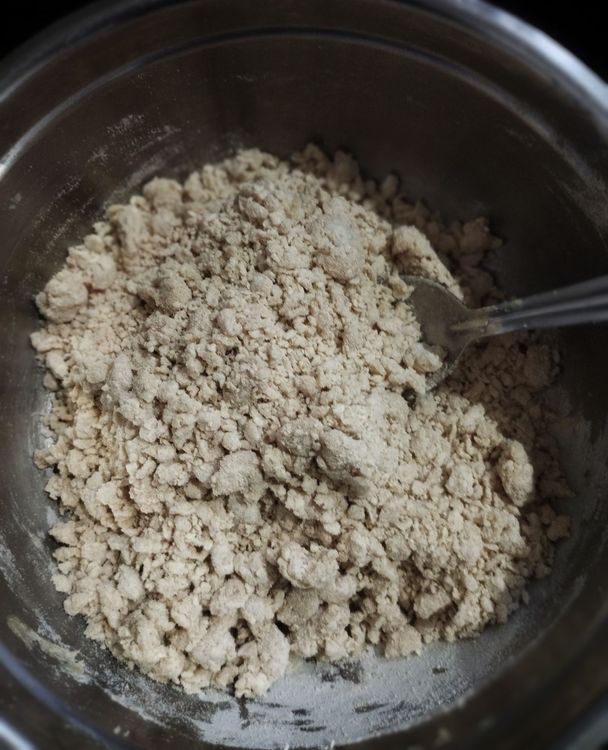 Step 1.1: Pour the boiling water into the flour and mix with a spatula