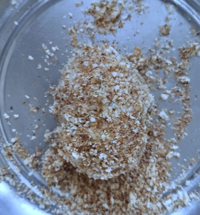 Step 1.1: Dip each potato-covered egg in the batter, then coat with bread crumbs
