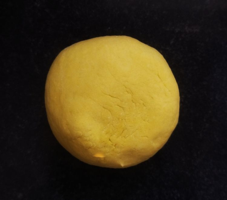 Step 1.1: Gradually add water and knead it into a soft dough