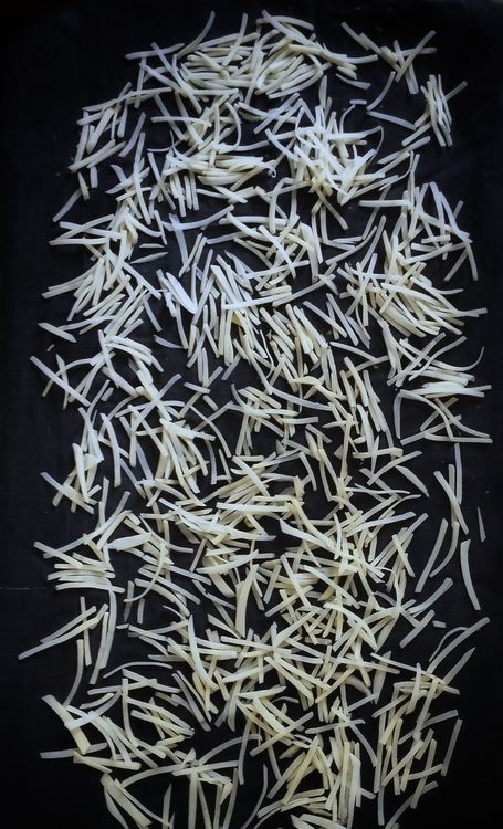 Step 1.1: Strain the potato sticks and spread them on a towel to dry out completely