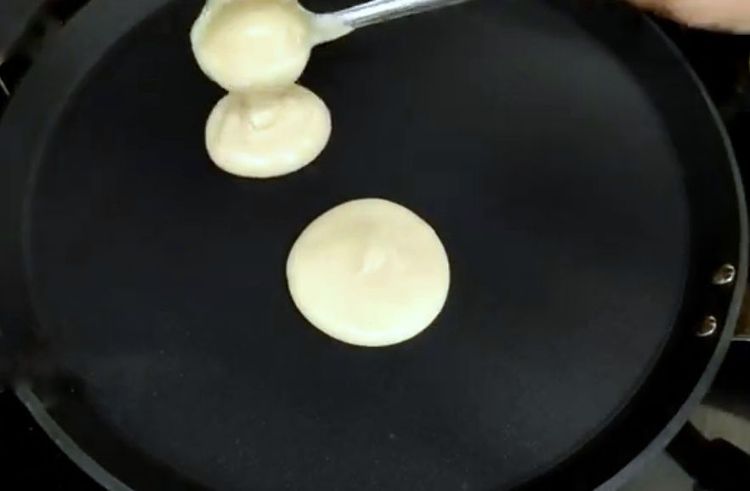 Step 2.1: Pour a small spoonful of batter into the hot pan