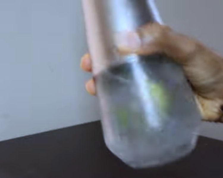 Step 1.1: Shake briskly to combine all the flavors from the lemon, green chilli, and mint
