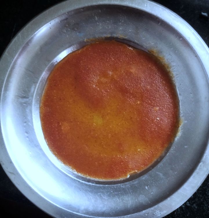 Step 1.1: Remove the plate from the steamer and de-mould the pappadam using a spoon