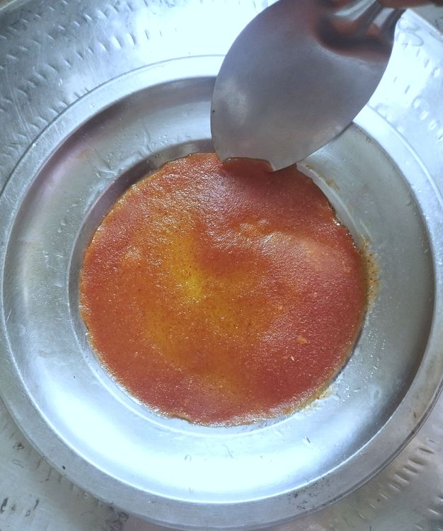 Step 1.2: Remove the plate from the steamer and de-mould the pappadam using a spoon