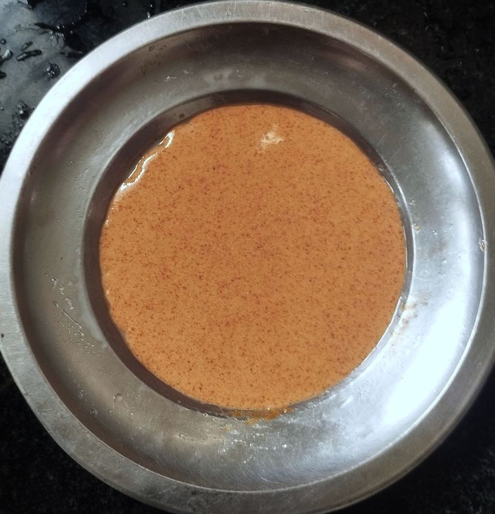 Step 1.1: Turn and tilt the plate so that the batter spreads evenly into a thin layer