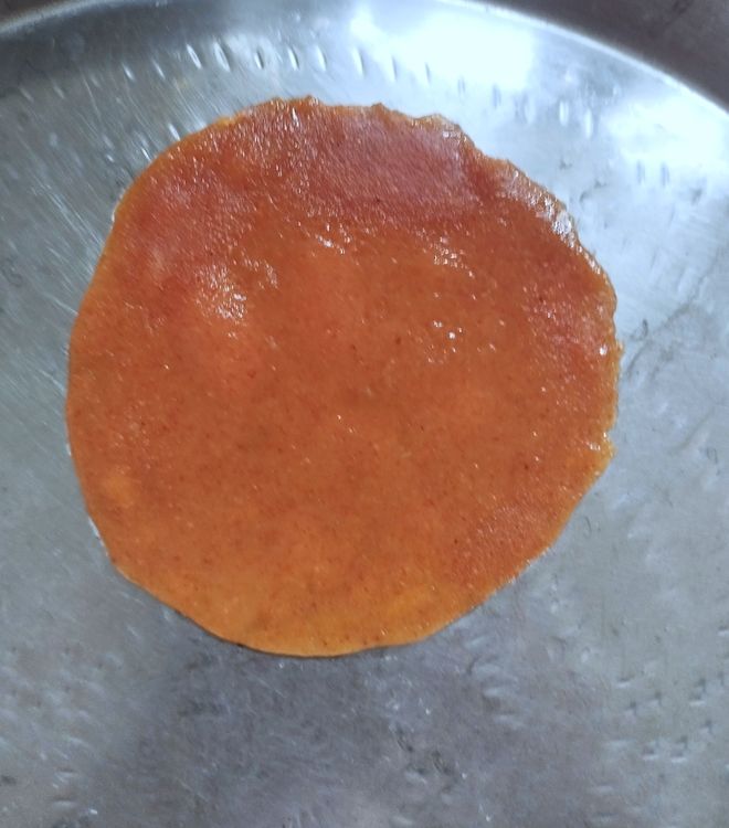 Step 1.4: Remove the plate from the steamer and de-mould the pappadam using a spoon