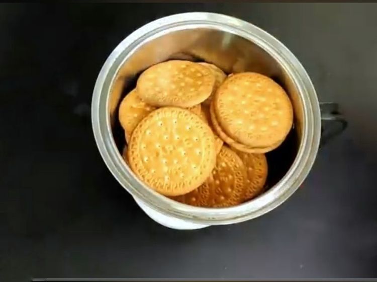 Step 1.2: Add Bourbon biscuits and Marie biscuits to a mixer jar and coarsely crush them