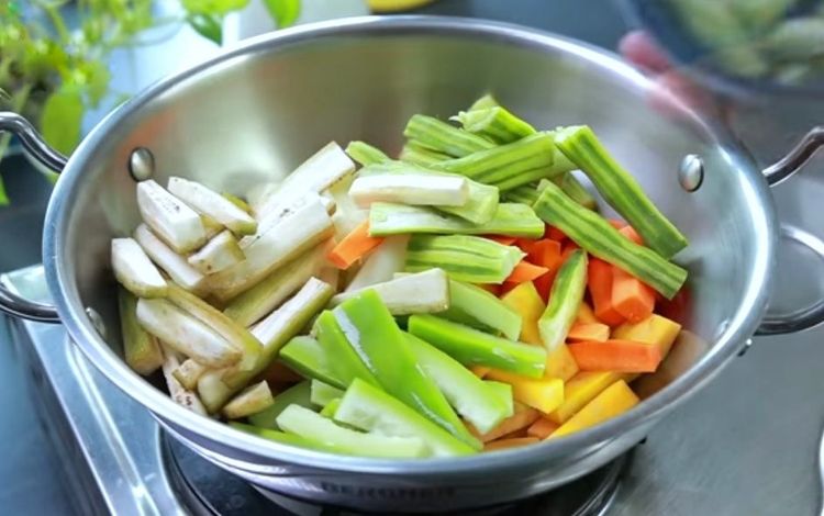 Step 1.1: Clean the vegetables, then peel and cut them into medium long sticks or batons