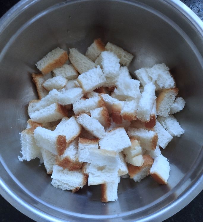 Step 1.1: Cut the bread into medium-sized cubes