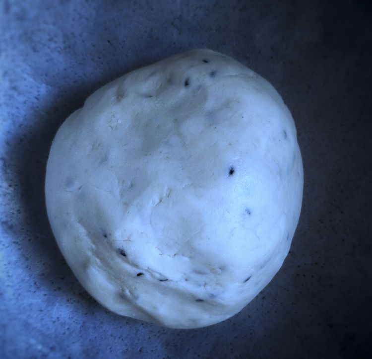 Step 1.1: Gradually add water and knead the dough until it becomes smooth and non-sticky