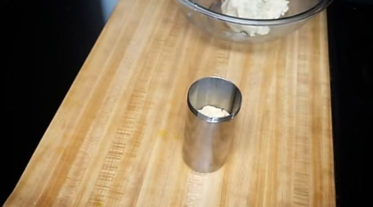 Step 1.1: Shape the dough into a cylinder and place it inside the murukku maker