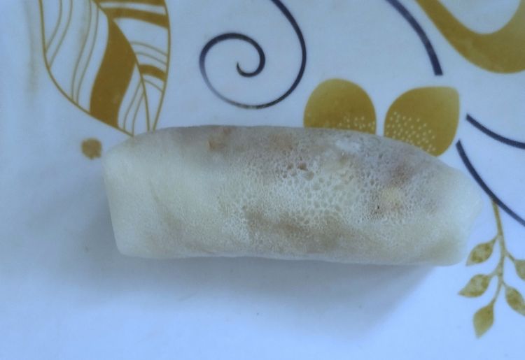 Step 3.4: Place some filling on one side and roll it up