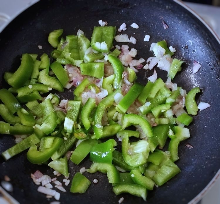 Step 1.1: Add bell pepper pieces and sauté for 2 minutes