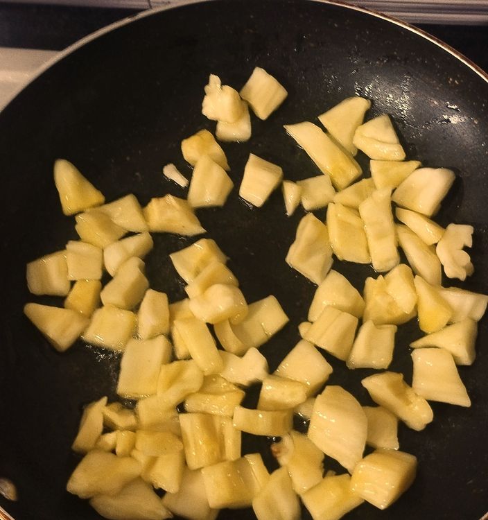 Step 1.1: Add ripe jackfruit pieces and sauté for 2-3 minutes