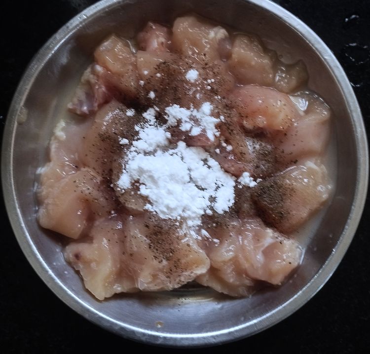 Step 1.1: Once done, add pepper powder, salt, soya sauce, and corn flour
