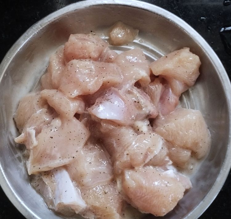 Step 1.2: Once done, add pepper powder, salt, soya sauce, and corn flour