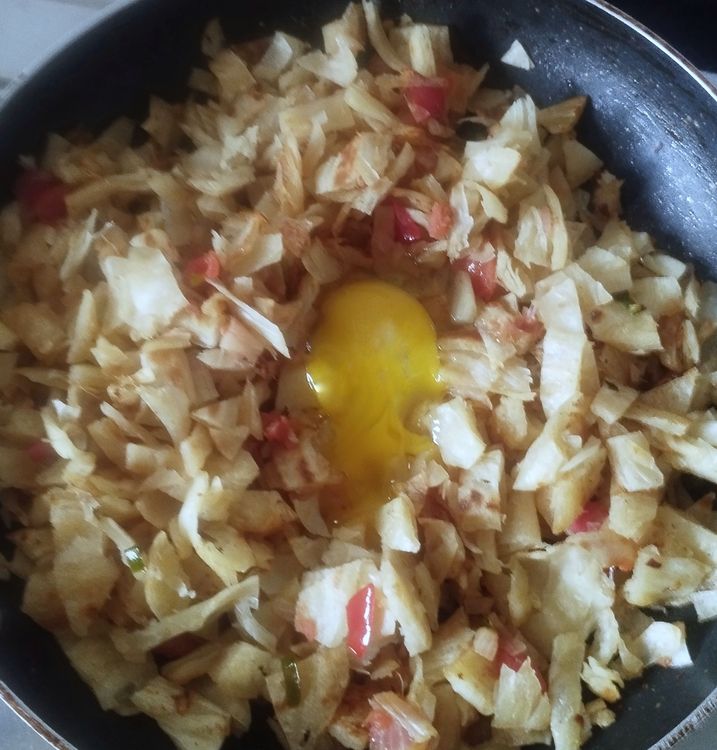 Step 1.1: Now add the egg and mix well
