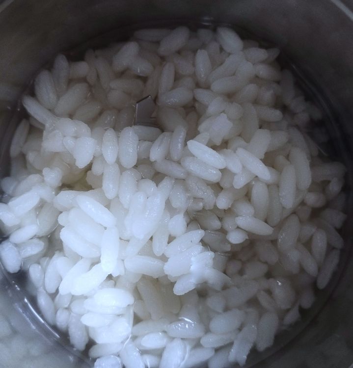Step 1.1: Add steamed rice and water to a blender and blend until smooth