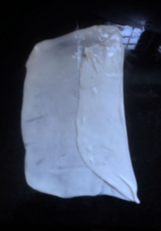 Step 1.1: Fold one-third of one side towards the middle