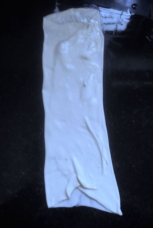 Step 1.1: Fold the other side towards the middle and place it over the folded side
