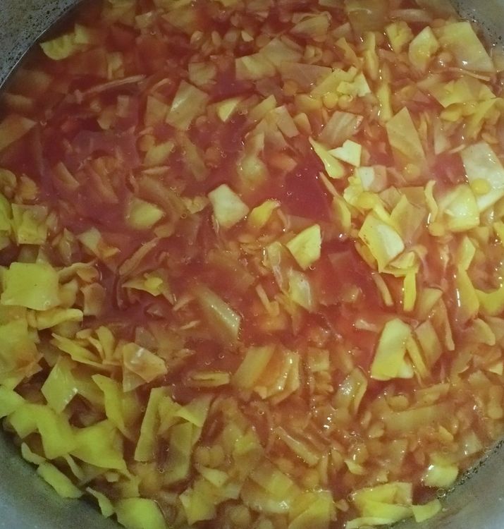 Step 1.1: When the pressure is completely gone, open the lid and add chopped cabbage, chilly powder, and salt