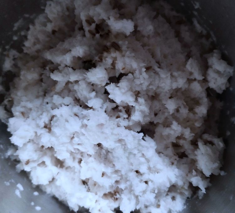 Step 1.1: To a mixer jar and add grated coconut, cumin seeds, and shallots