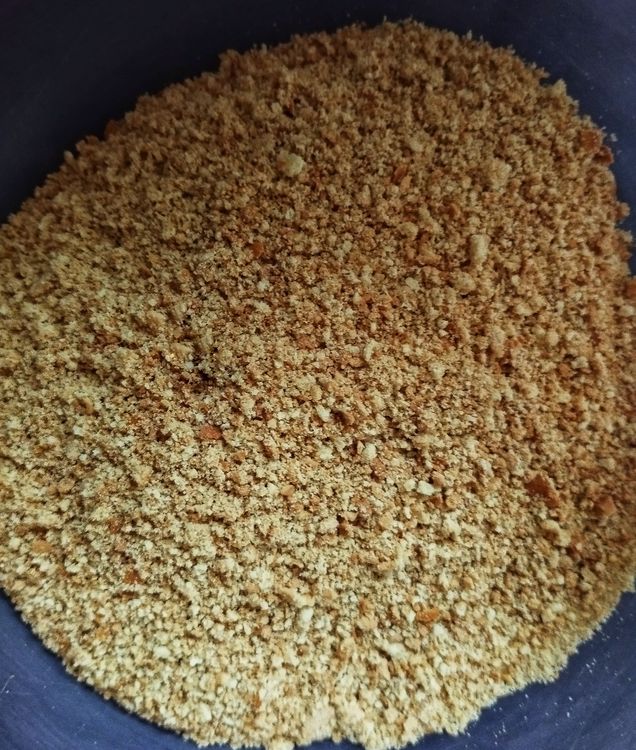 Step 1.1: Transfer the cracked biscuits to a mixer jar and grind them into a nice powder