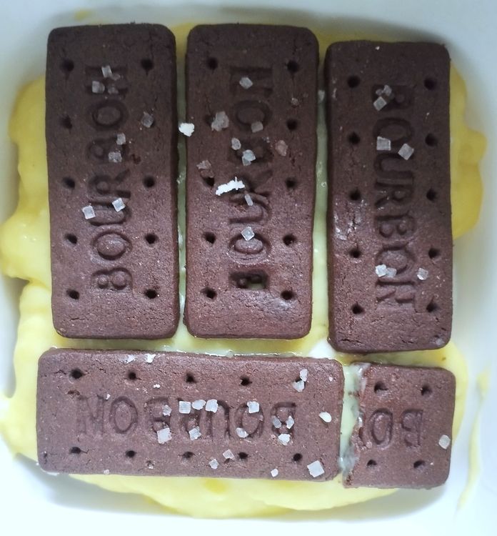 Step 1.1: Again Place the biscuits over that and again layer with custard mix