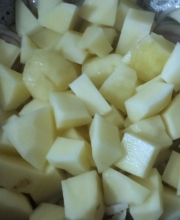 Step 1.1: Peel and cut the potato into medium cubes