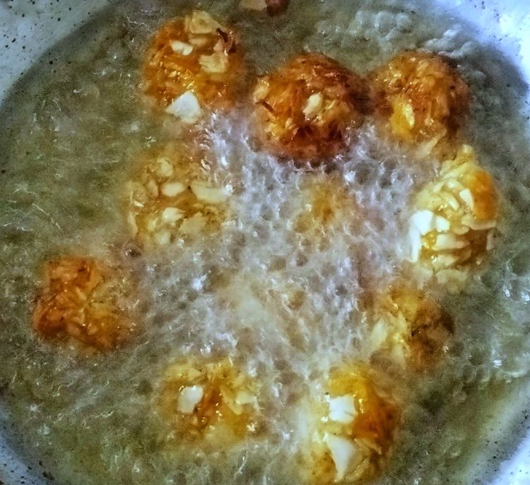 Step 1.1: When the oil becomes hot, add the balls