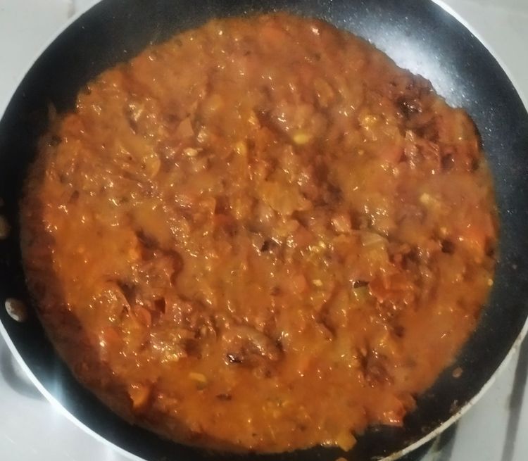 Step 1.1: Add 40 mL of water and sauté until the tomatoes are cooked well and become mushy