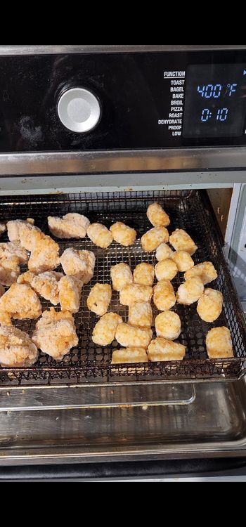 Step 1.1: Air fry the nuggets and tater tots until they are golden brown and crispy, nuggets take about 8 mins and the tots approximately 10-12 minutes